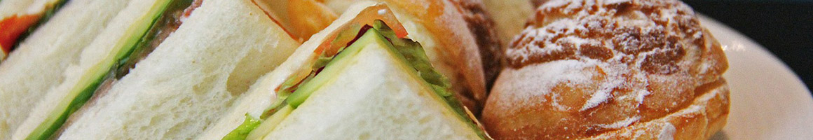 Eating American (New) Breakfast & Brunch Sandwich at Tenth West restaurant in Seattle, WA.